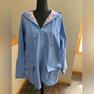 Women’s JG Hook blue with cotton plaid lining rain coat with hood. Size medium